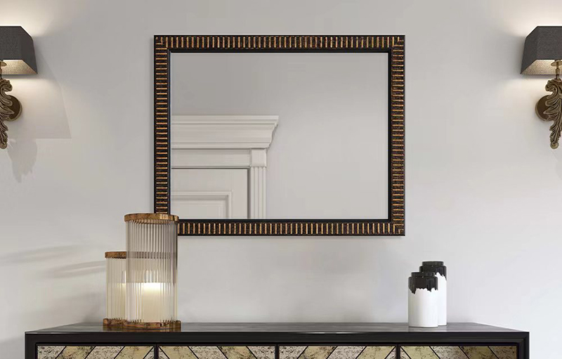 this gold wall mirror exudes charm and elegance