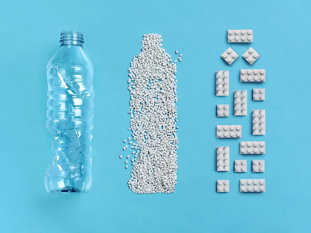 Recycled PET bottles are transformed into plastic granules and repurposed as sustainability building blocks.