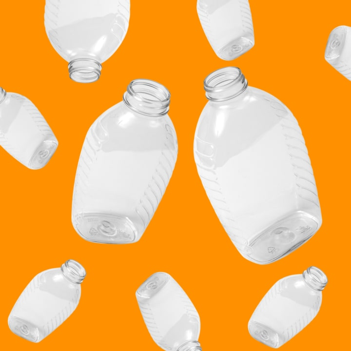 Clear PET plastic bottle suitable for holding various liquids or beverages.